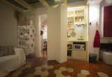 The kitchenette and the entrance to the bathroom