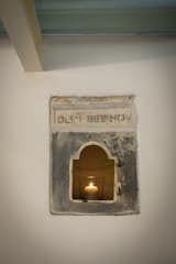 They used to store the holy oil here. Now it's a perfect spot for candles.