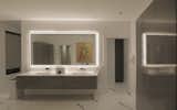 Bath Room, Engineered Quartz Counter, Accent Lighting, Ceramic Tile Floor, Enclosed Shower, Ceiling Lighting, Recessed Lighting, Porcelain Tile Floor, Wall Mount Sink, Quartzite Counter, and Wall Lighting Master bath  Photo 13 of 16 in Rhode Island - Modern Gem by ModernKitchenDesigner | Boston