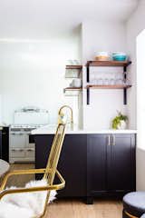 Spare shaker style cabinets are a budget option in disguise. IKEA doors were sprayed with Benjamin Moore Black in a satin finish