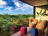 Guests can enjoy the sunset overlooking Tulum National Park.