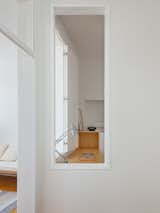 Cutouts and Heightened Ceilings Revive a Portuguese Apartment - Photo 7 of 24 - 