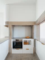 Cutouts and Heightened Ceilings Revive a Portuguese Apartment - Photo 4 of 24 - 