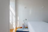 Cutouts and Heightened Ceilings Revive a Portuguese Apartment - Photo 23 of 24 - 