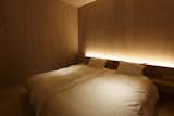 Bedroom, Bed, Wall Lighting, Medium Hardwood Floor, and Ceiling Lighting 1st bed room  Photo 8 of 17 in My Kyoto Town House by Shinichi Osawa