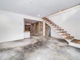 Custom stairs feature wood from 1920s cabin