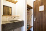 Bath Room, Mosaic Tile Wall, Concrete Counter, Concrete Floor, Pendant Lighting, Concrete Wall, Open Shower, Two Piece Toilet, and Vessel Sink Bathroom  Photo 19 of 48 in Nomadic Nosara by Janice Camp