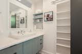 Custom built vanities and barn door storage