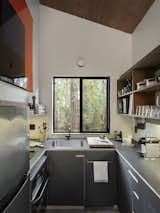 Kitchen cabinets redone in ultra matte black laminate