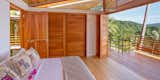 a soothing night's sleep among the treetops. At The Floating House, the jungle backdrop eases into rhythm with the waves.