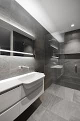 ‘Linear’ – The sink console and the walk-in shower.