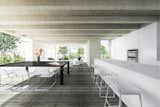 Kitchen, White Cabinet, Wall Oven, Dark Hardwood Floor, and Engineered Quartz Counter Rear of the house - The open Kitchen-Dining  Photo 4 of 6 in Timber Extension in Surrey by Daniele Petteno Architecture Workshop