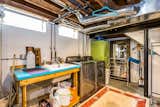 Ideally quiet basement laundry with Samsung appliances and printer for home office needs.