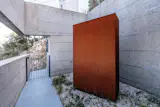 the patio and the cabinet for the heat pump
