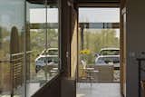Transparent House with Sliding Doors Open