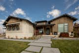 Front view of this contemporary Craftsman home.