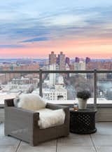 Outdoor, Small Patio, Porch, Deck, Rooftop, Concrete Patio, Porch, Deck, and Vertical Fences, Wall The final result is a contemporary penthouse, with gorgeous views and bespoke furnishings, for this discerning client.  Photo 17 of 17 in Central Park West Penthouse by Decor Aid