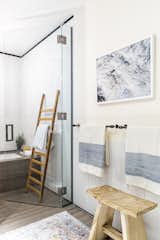 All artwork throughout the apartment are prints from our client’s personal photo archive.