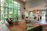 The great room and kitchen, featuring 14-foot window and 16-foot ceilings