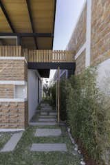 Exterior Entrance  Photo 10 of 16 in Home in the Setback by Vera + Ormaza Arquitectos