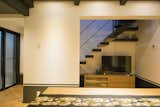 Living Room Living room space facing the stairway.  Photo 4 of 10 in Kurono Machiya by szuwen