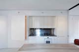 Kitchen, Plywood, Refrigerator, Metal, Undermount, Metal, Range Hood, Wall, Range, White, and Cooktops  Kitchen Metal Wall Undermount Plywood Photos from Ridgewood Townhouse
