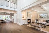 Built on three levels, the main floor openly flows from the 18’ ceiling entryway to the gourmet chef's kitchen and family room. 
