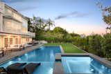 The expansive backyard with pool/spa and custom-built BBQ with Lynx appliances. 