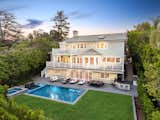 This house was designed for the views and maintains continuity of style throughout the interior to the exterior with its full-length balcony on the main floor and private balcony off the master suite.
