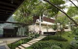 Outdoor, Large Patio, Porch, Deck, Front Yard, Trees, Walkways, Horizontal Fences, Wall, Gardens, Wood Fences, Wall, and Metal Fences, Wall  Photo 2 of 8 in BISHOPSGATE HOUSE by WOW Architects | Warner Wong Design