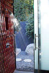 Bathroom #2 complete with outdoor access and custom red tile