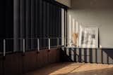 Office and Medium Hardwood Floor Louvers animate the interior spaces with an ever-changing play of light and shadow.    Photo 12 of 22 in Trio Stack (a.k.a Project #10) by Studio Wills + Architects