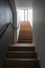 A new flight of stairs 'snakes' up and leads to the top-most floor...