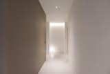Advancing further along the Backdrop in Taupe, the route culminates at a foyer leading to a cluster of rooms.