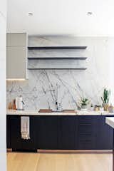 Kitchen, Dishwasher, Medium Hardwood Floor, Ceiling Lighting, Undermount Sink, Wood Cabinet, Stone Slab Backsplashe, and Marble Counter Paonazzo marble with custom cabinetry at the Kitchen  Photo 2 of 12 in West Hollywood 19 by Taylor Hallam