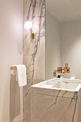 Custom Lilac marble pedestal sink with Dornbracht fixtures