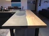 Kitchen, Wood Counter, and Concrete Counter Live edge wild cherry slab and concrete, steel I beam base  Photo 18 of 19 in McCandliss Residence by Cory W. McCandliss