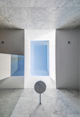 Bath Room, Marble Wall, Open Shower, and Ceiling Lighting Bathroom skylight detail.  Photo 9 of 24 in Cloud House by Jacqueline Perrett