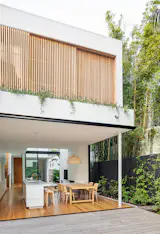 Rear of Cloud House. The master bedroom's rosewood privacy screens drawn closed.