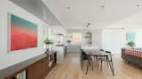 Dining Room, Chair, Shelves, Ceiling Lighting, Table, and Light Hardwood Floor  Photo 1 of 6 in 16th St Residence by bldg.collective