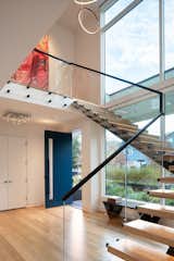 Staircase, Glass Railing, and Wood Tread  Photo 1 of 12 in Valley View Residence by bldg.collective