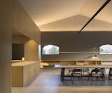 Dining Room, Table Lighting, Table, Shelves, Bar, and Concrete Floor  Photo 1 of 30 in Sant Martí House by Francesc Rifé Studio