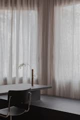 Detail of the dining room table with a Tubino vase Pinasaan by Claudia Girbau.