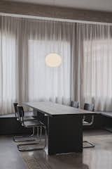 Main dining room table made of poplar wood stained black.