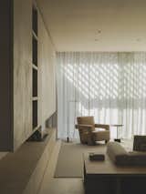 Utrecht armchair by Cassina and Roy floor lamp by Viabizzuno.