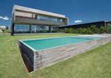 Outdoor, Small Pools, Tubs, Shower, Garden, Grass, Concrete Patio, Porch, Deck, Concrete Fences, Wall, Landscape Lighting, and Concrete Pools, Tubs, Shower  Photo 17 of 36 in 10 House by Luciano Kruk arquitectos
