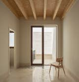 Bedroom, Limestone Floor, Recessed Lighting, and Chair Bedroom with terrace  Photo 18 of 25 in House of giants by Rubén Gutiérrez Rodríguez