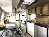 Having a functional kitchen was a huge priority for us. We cook in here every day. We added lots of storage and kept as much counter space as we could!