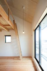 Bedroom, Light Hardwood Floor, Accent Lighting, and Ceiling Lighting  Photo 10 of 19 in A-small-house-in-higashimurayama by keigo iiduka