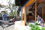 Outdoor, Metal Fences, Wall, Stone Patio, Porch, Deck, Concrete Patio, Porch, Deck, Front Yard, and Walkways  Photo 12 of 19 in A-small-house-in-higashimurayama by keigo iiduka